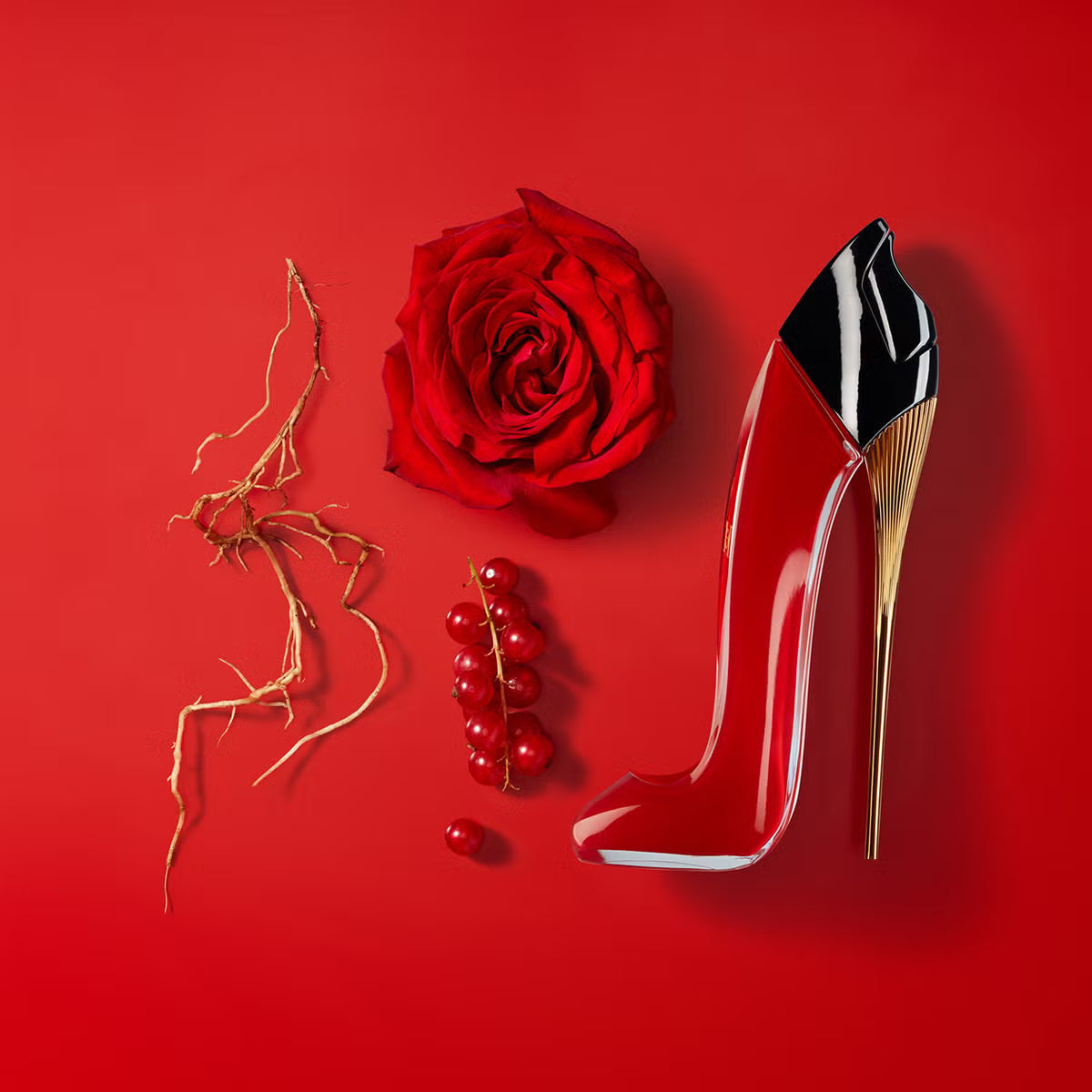 Carolina Herrera Very Good Girl - frasco con rosa roja y grosella